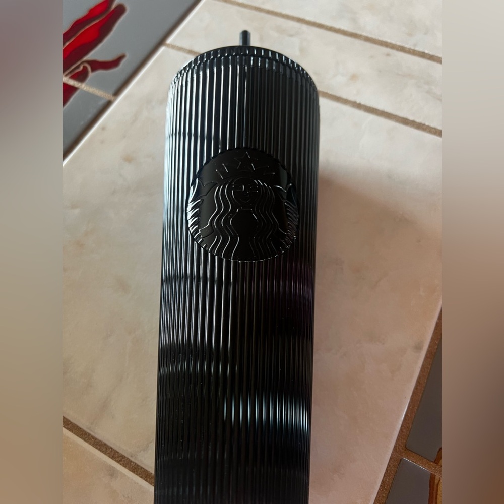 Black Starbucks cup, used a few times virtually new!